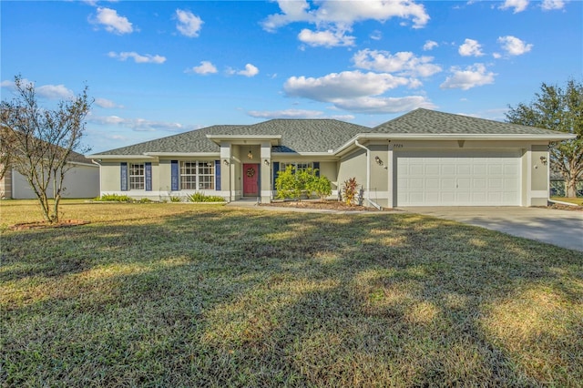 ranch-style house featuring a front yard and a garage