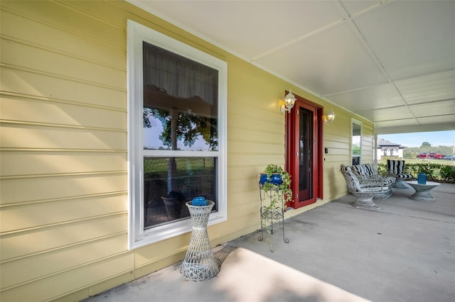 view of patio featuring a porch