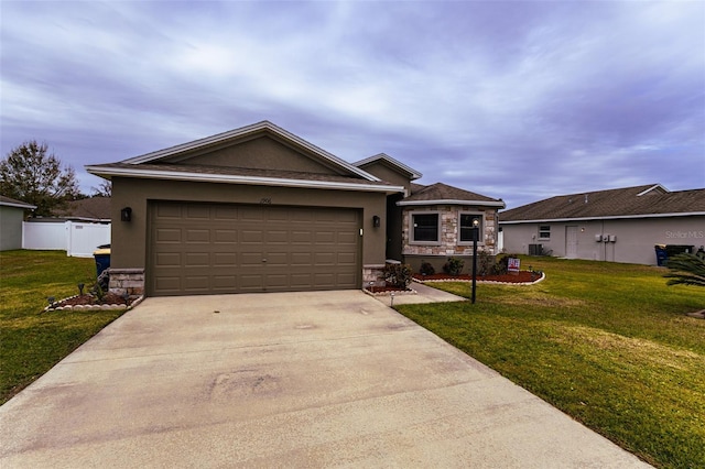 ranch-style house featuring a front lawn and a garage