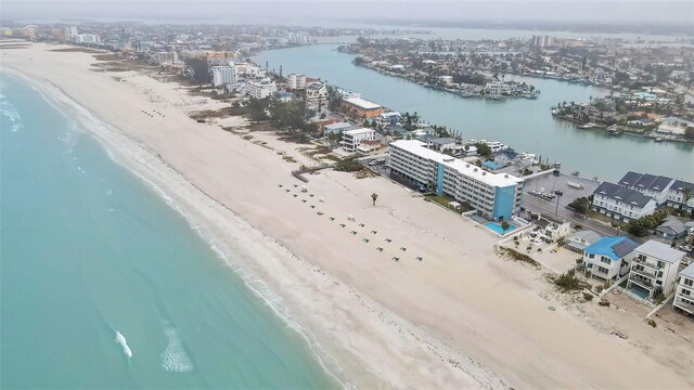 drone / aerial view with a view of the beach and a water view