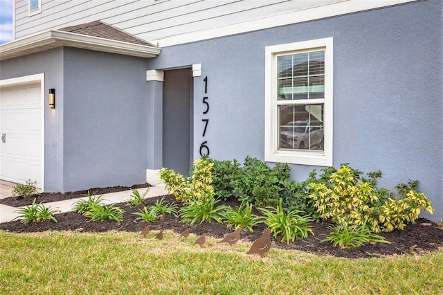 entrance to property with a garage