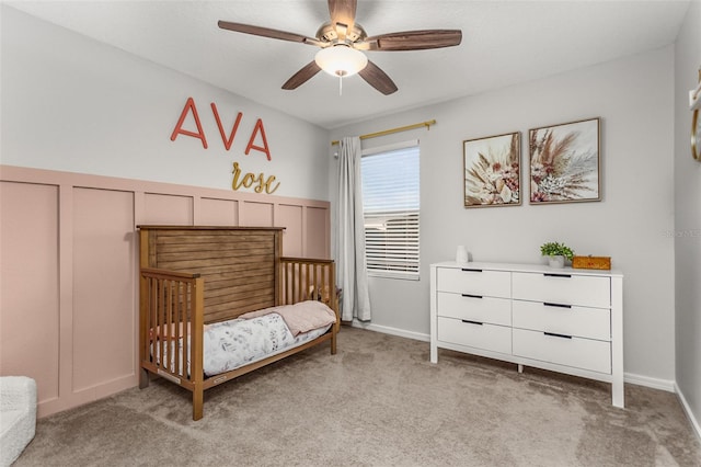 carpeted bedroom featuring ceiling fan