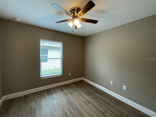 unfurnished room with ceiling fan and light hardwood / wood-style flooring