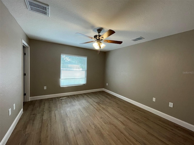 unfurnished room with a textured ceiling, hardwood / wood-style floors, and ceiling fan