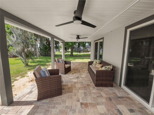 view of patio / terrace with ceiling fan and an outdoor hangout area