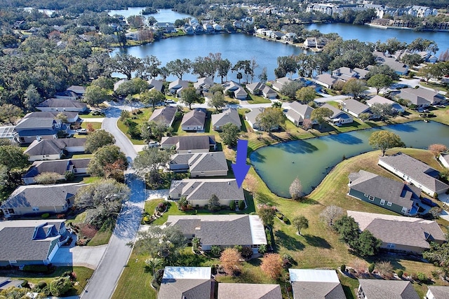 drone / aerial view with a water view