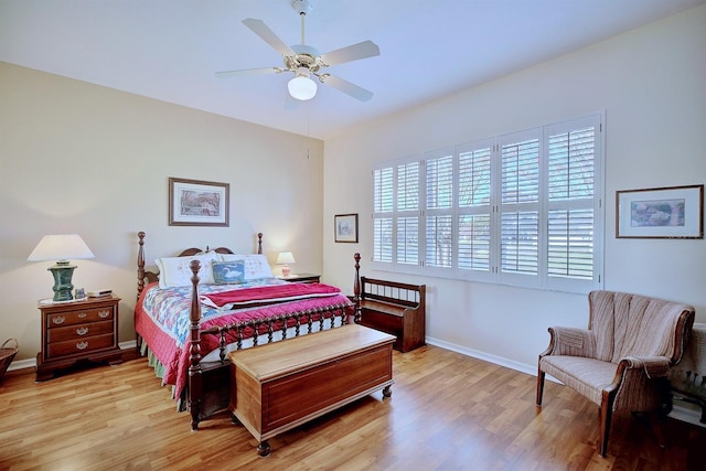 bedroom featuring ceiling fan and light hardwood / wood-style flooring