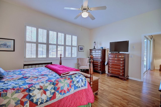 bedroom with light wood-type flooring and ceiling fan