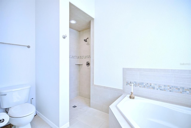 bathroom featuring toilet, tile patterned floors, and independent shower and bath