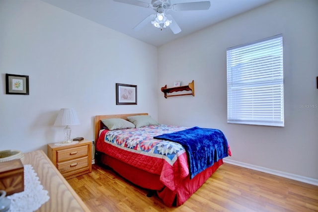 bedroom featuring ceiling fan and light wood-type flooring