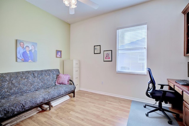 office space featuring ceiling fan and light hardwood / wood-style flooring