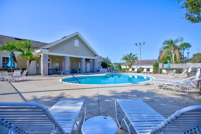 view of pool with a patio