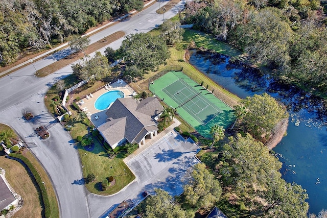 birds eye view of property featuring a water view