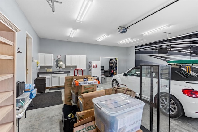 garage featuring a garage door opener