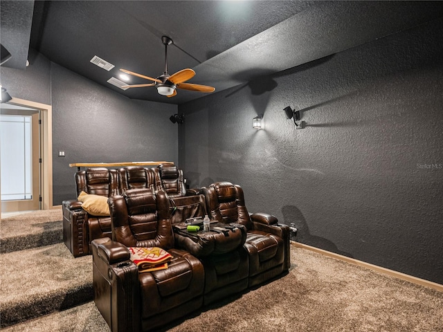 carpeted cinema featuring vaulted ceiling and ceiling fan