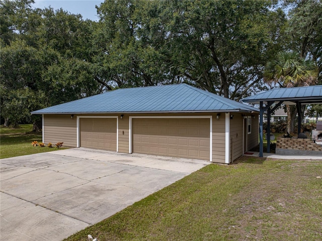 garage with a lawn