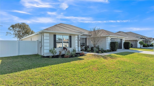 view of front facade featuring a garage and a front yard