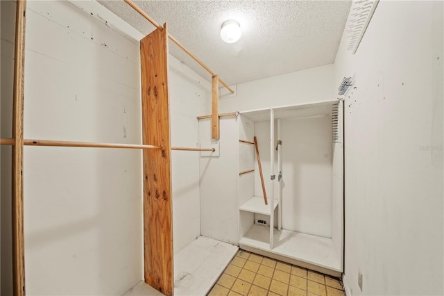 bathroom featuring a textured ceiling