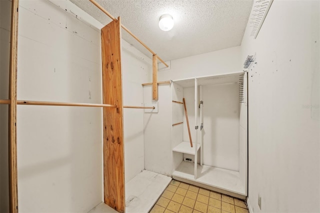 bathroom with a textured ceiling