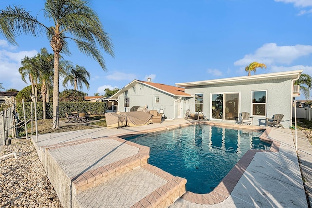 view of pool featuring a patio area