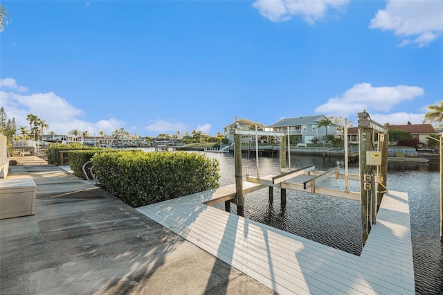 dock area featuring a water view