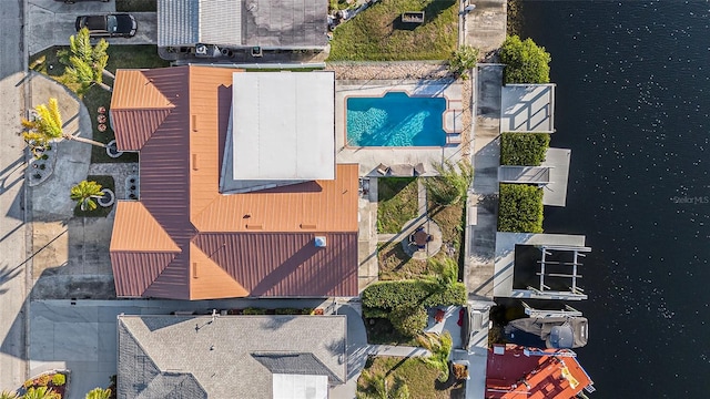 birds eye view of property featuring a water view