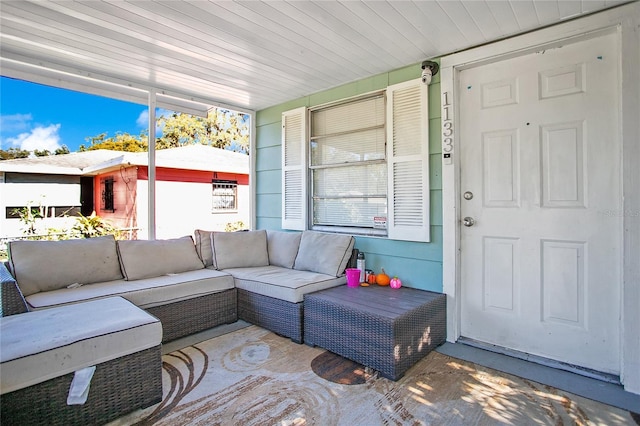 exterior space with a porch and an outdoor living space