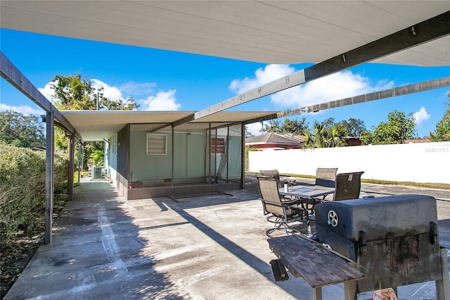 view of patio featuring central AC and a grill