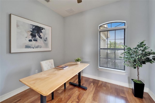 office area featuring wood-type flooring and ceiling fan