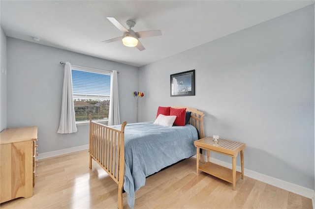 bedroom featuring ceiling fan and light hardwood / wood-style floors