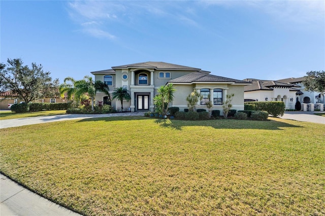 view of front of home featuring a front lawn