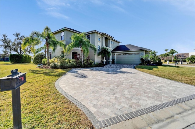 view of front facade with a garage and a front yard