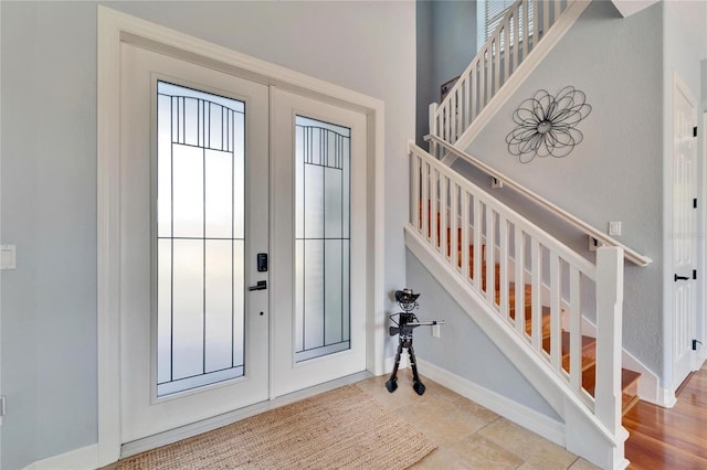 entrance foyer featuring french doors