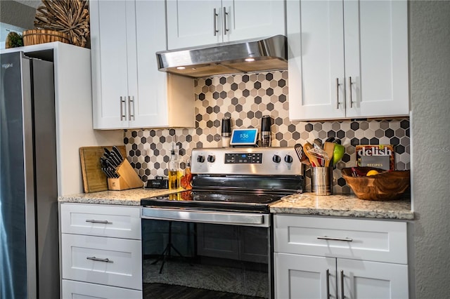 kitchen with white cabinetry, light stone countertops, backsplash, and stainless steel appliances