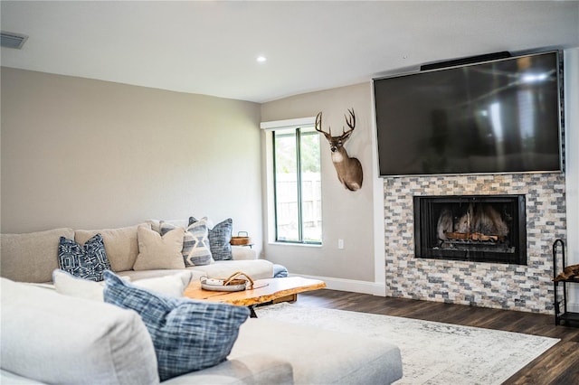 living room featuring dark wood-type flooring