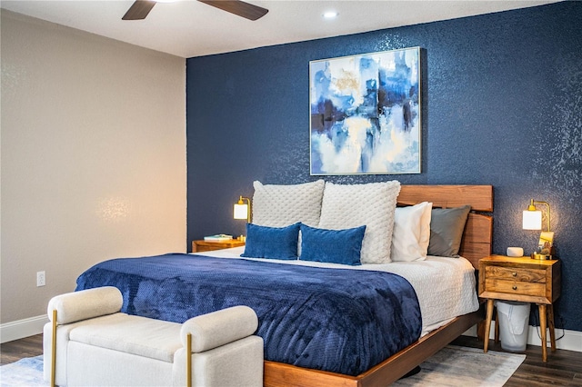 bedroom with ceiling fan and wood-type flooring