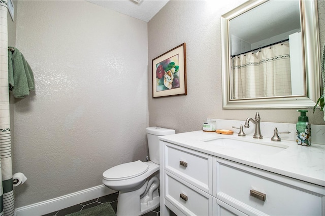 bathroom featuring toilet, a shower with curtain, tile patterned floors, and vanity