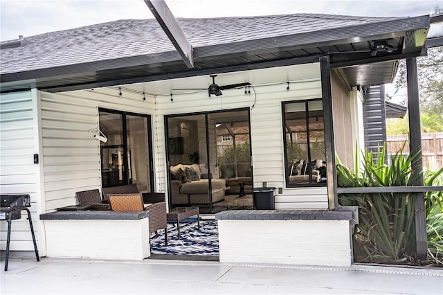 view of patio / terrace with ceiling fan and outdoor lounge area