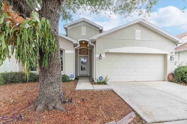 single story home featuring a garage