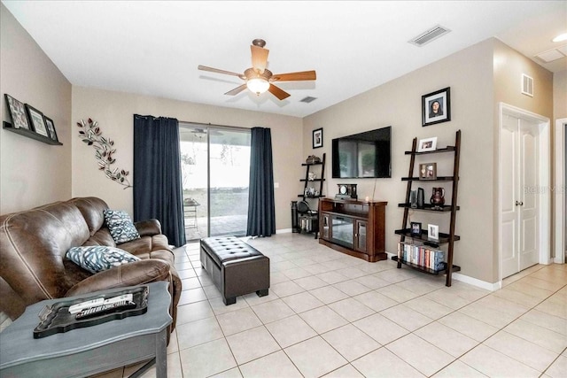 tiled living room featuring ceiling fan