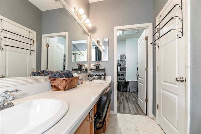 bathroom with vanity and tile patterned floors