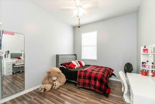 bedroom with ceiling fan and hardwood / wood-style floors