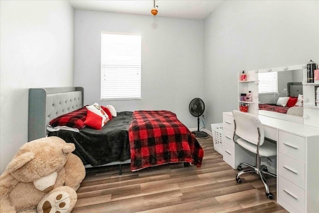 bedroom with light hardwood / wood-style floors