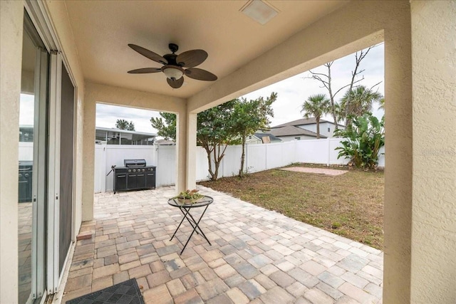 view of patio / terrace featuring ceiling fan