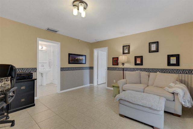 living room featuring light tile patterned floors