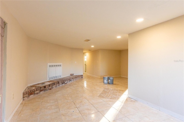 empty room featuring light tile patterned floors