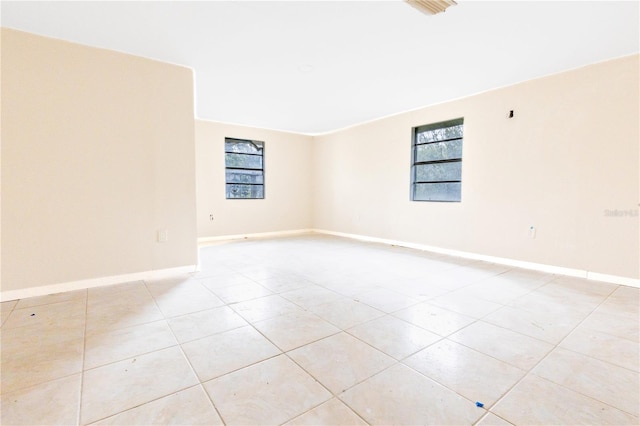 view of tiled spare room