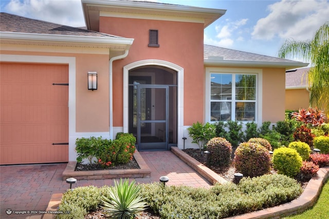 property entrance featuring a garage