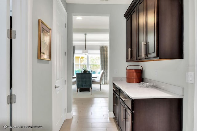 interior space featuring dark brown cabinetry