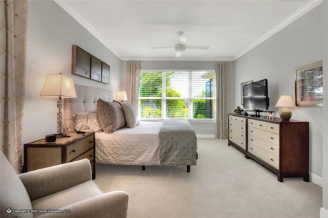 bedroom featuring ceiling fan, crown molding, and light carpet